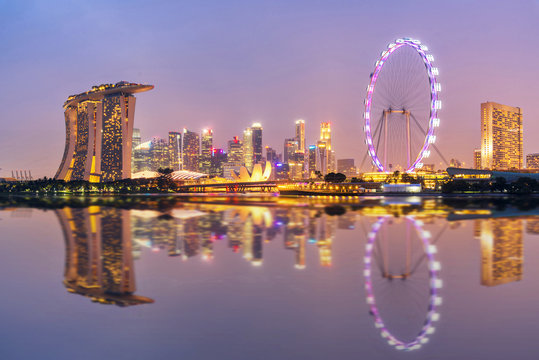 Singapore Skyline. Singapore`s business district, blue sky and night view for marina bay sand