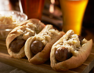 german bratwursts and sauerkraut with beer