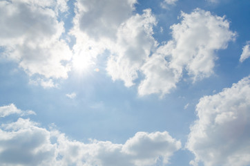 Sunshine on blue sky with white cloud