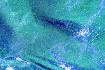 Blue and turquoise glitter fabric.