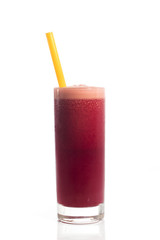 A glass of red healthy juice isolated over a white background