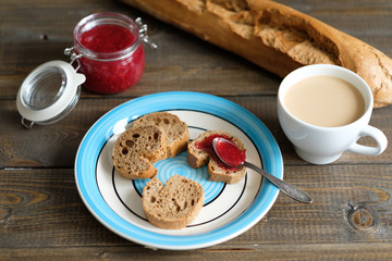 coffee slices of baguette with jam