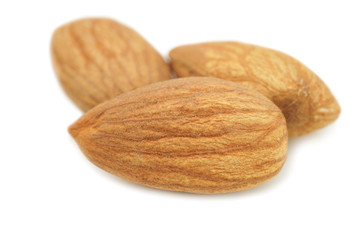 Almonds isolated on white background.