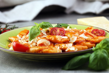 Ravioli with tomato sauce and basil