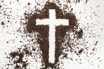 Cross in dust.