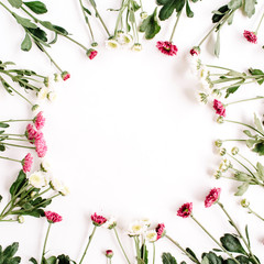 Wreath frame of red and white wildflowers, green leaves, branches on white background. Flat lay, top view. Valentine's background