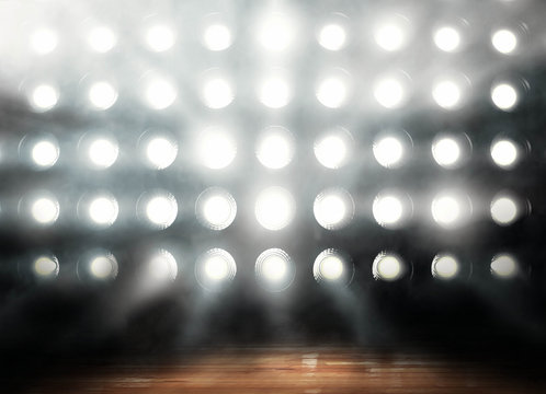 Professional basketball parquet in lights background render