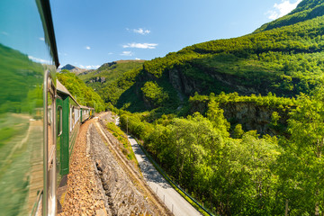 Naklejka premium Flambsbana, The Flam Railway, spectacular train journey around mountains. Norway