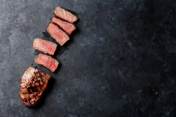 Photo sur Plexiglas Steakhouse Grilled sliced beef steak