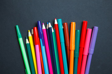 Color pencils on dark background