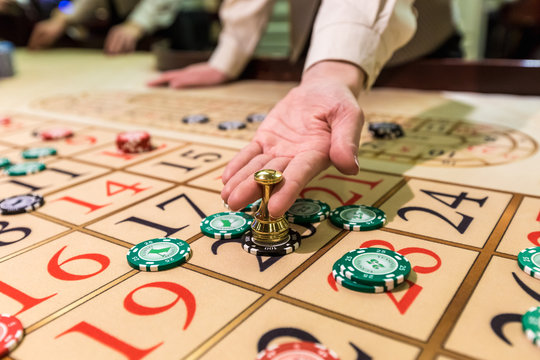 gambling chips on a game table roulette