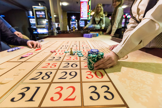 gambling chips on a game table roulette