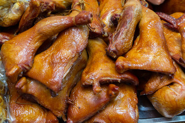 Smoked chicken legs on the counter closeup. Food