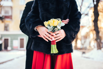 Young wedding couple walking on the street