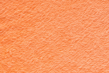 orange texture of towel like background, close up