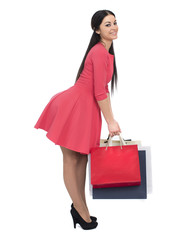 Young brunette woman with some shopping bags