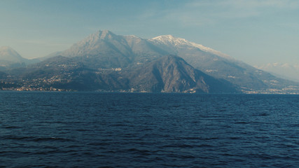 Panoramic view of Lake Como, the Alps above it and the nature around it.