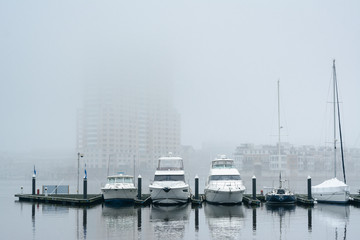 A marina in fog, at the Inner Harbor, in Baltimore, Maryland.