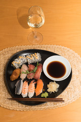 Fototapeta na wymiar Sushi meal with white wine