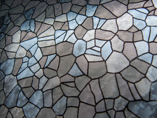 Glass with a gray-blue texture with a gradient (the pattern is similar to stones).