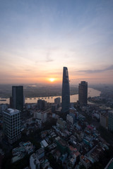 Fototapeta premium Ho Chi Minh city, Vietnam - February 26, 2017: Aerial view of houses and Business and Sai Gon Center of Ho Chi Minh city