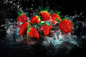 Strawberries in water splash