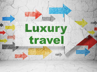 Vacation concept: arrow with Luxury Travel on grunge wall background