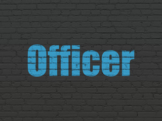 Fototapeta premium Law concept: Officer on wall background