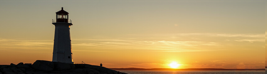 Peggy& 39 s Cove Lighthouse, Nova Scotia bij zonsondergang.
