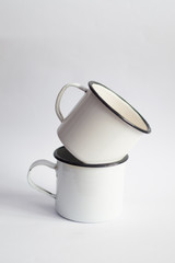 White enamel mugs