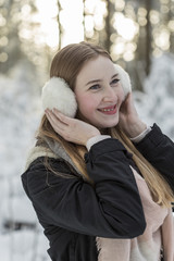 young woman snow walk beauty portrait fun smile candid