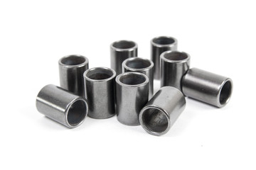 Metal cylinders on white background. Mechanics and Engineering Technology.