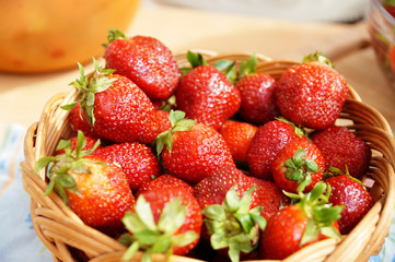 Bright fresh strawberry in a round container