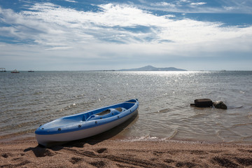Blue boat on  the beach, Sharm El Sheikh, Nabq bay, Egypt