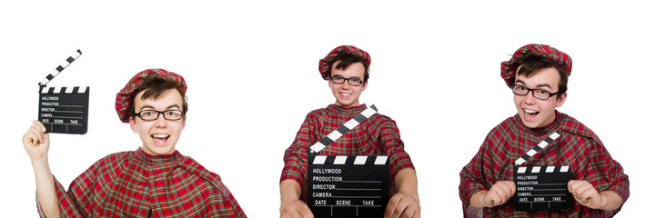 Funny scotsman with movie board on white