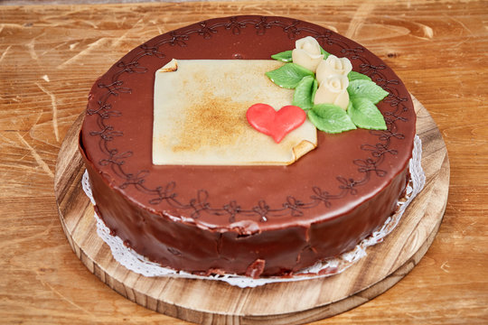 Chocolate Cake For Birhtday On Wooden Table