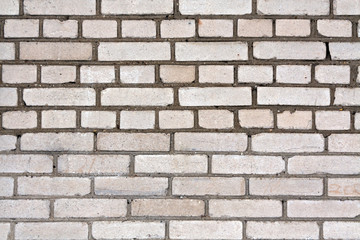 Gray color grungy brick wall pattern.