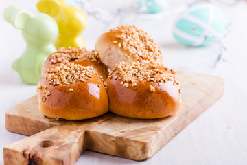 Homemade brioche buns on Easter table