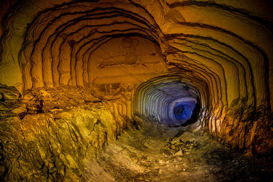 Concept of Alien, Prometheus. Abandoned chalk mine tunnel with fantastic traces of drilling machine, Belgorod, Russia