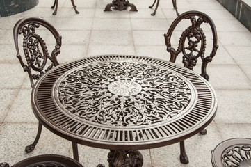 Cast iron garden table and chairs