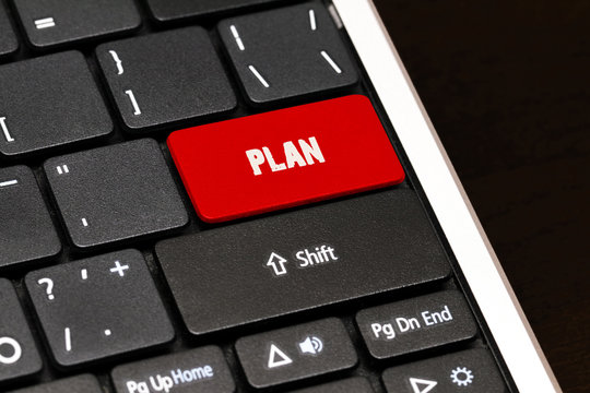 plan on Red Enter Button on black keyboard