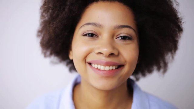 happy smiling african american young woman face