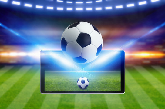 Soccer game online concept, green soccer field, bright spotlight