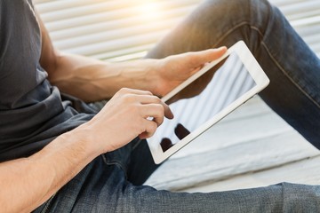 Fototapeta premium Man works on digital tablet.