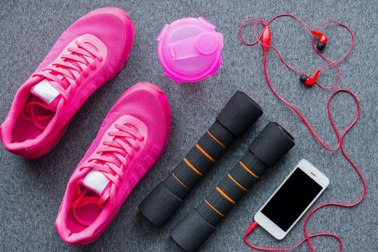 sports equipment for fitness training on a gray background