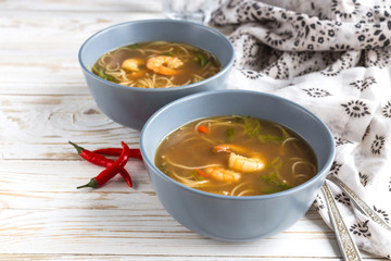 Simple Thai soup with shrimp, lemongrass, chilli and noodles