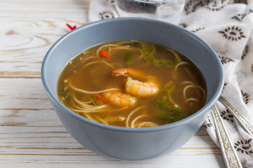Simple Thai soup with shrimp, lemongrass, chilli and noodles