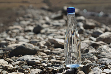 Water bottle on a stone background