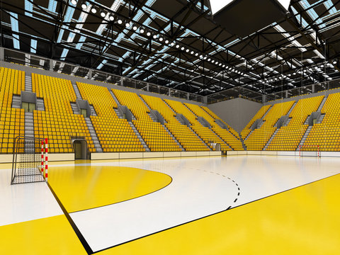 Bbeautiful sports arena for handball with yellow seats and VIP boxes