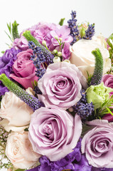 Close up bouquet with violet rose.